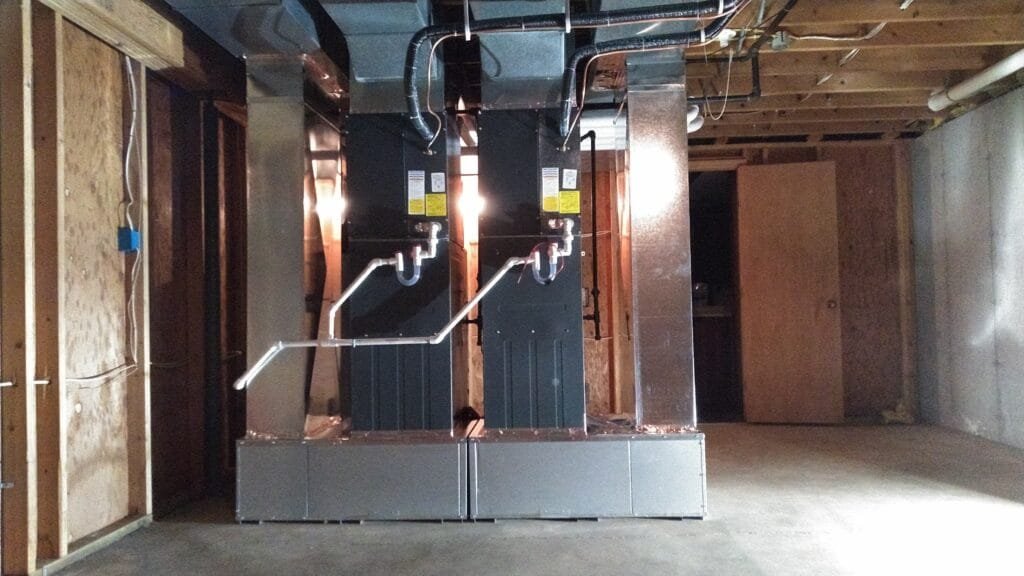 Front view of two newly installed, energy-efficient Franklin furnaces providing robust zoned heating for a large Indiana home.